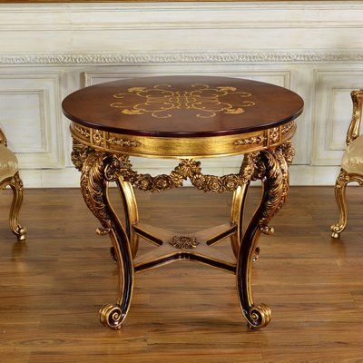 Rosdorf Park Victorian style inlaid center/foyer table round Console Table inlaid with golden details and walnut burl. The design of the inlaid table features antique gold accents and radiating motif inlaid in the center of the tabletop. Glass top included. | Rosdorf Park Rosia 35.63" Console Table, Wood in Gold/Black, Size 32"H X 35"W X 35"D | Wayfair Rococo Table, Round Console Table, Lacquer Dresser, Traditional Console Tables, Rococo Decor, French Console Table, Console Table Wood, Glass Top End Tables, Marble Console Table