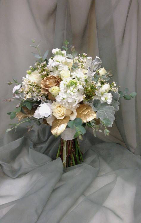 White Bouquet With Gold Ribbon, Gold Floral Bouquet, Gold White Champagne Wedding, White And Copper Bridal Bouquet, Gold And White Bouquet Wedding, White And Rose Gold Bouquet, White And Gold Wedding Flowers Bridal Bouquets, Forest Green And Gold Wedding Bouquet, Champagne Gold Bouquet