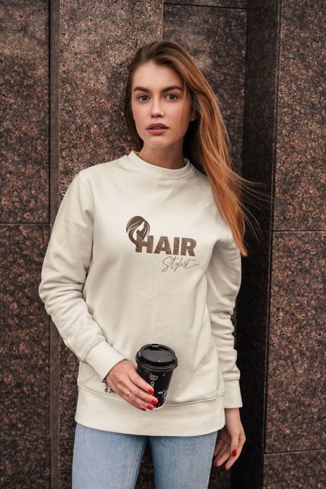 creme sweatshirt with the text hairstylist , the word hair in an animal print pattern Hair Stylist Gifts, Bold Letters, Shirt Hair, Bold Logo, Football Sweatshirt, Hair Dresser, Gameday Outfit, The Salon, Cozy Sweatshirts