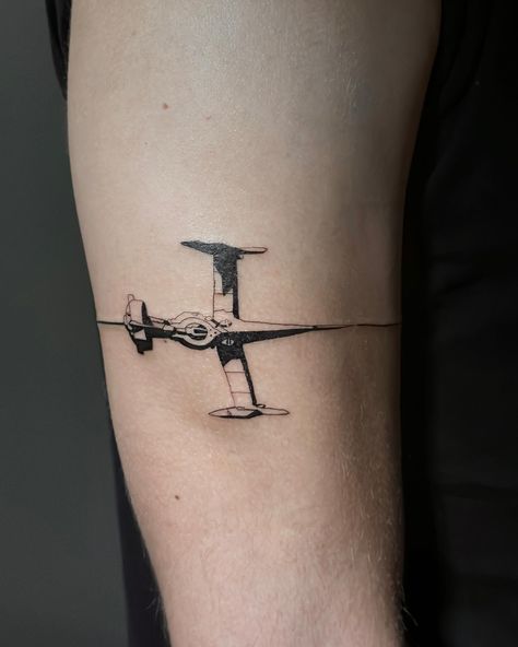 where the cowboy bebop fans at . spike’s ship with a (my first😨😮‍💨) band around the arm for rob’s first tattoo — i am so grateful thank you rob 🌟😭 . we stenciled the ship and freehanded the band. i have heard from other tattooers that straight lines on the body are an optical illusion since your body is only made of curves. i took my time and looked at it from afar about 800 times during the process and i’m pretty happy with the result 🤞🏼 rob is the mvp for patience and being down for the lea... See You Space Cowboy Tattoo, Cowboy Bebop Ship, Bebop Ship, Cowboy Bebop Tattoo, Spaceship Tattoo, Leg Patchwork, Video Game Tattoos, Cowboy Tattoos, Engraving Tattoo