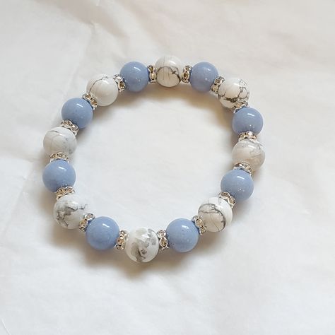 Blue Aragonite And Howlite Hand Made Genuine Stone Bracelet. The Blue Aragonite Glows In The Dark After Sun Exposure. 10mm Beads. **Ultra Durable Polyester Elastic Cord** Blue Aragonite Is A Strong Stone Of Spiritual Vision. It Will Bring More Joy And Optimism In Your Life, And It Will Provide Healing To Your Emotions. It Is A Throat Chakra Stone That Supports Communication. Howlite Can Bring Peace And Clarity Of Mind Upon Purchasing, Please Include Your Wrist Size. Pretty Beaded Bracelets, Stone Bead Bracelets, Bead Stretch Bracelets, Make Clay Beads, Girly Bracelets, Blue Aragonite, Makeup Images, Bracelet Inspo, Howlite Bracelet