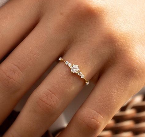 Unique minimalist 14k gold diamond cz engagement ring, Dainty & elegant diamond cz promise ring for her, Unique women gold ring gift for her WE OFFER UNLIMITED PERIOD INSTALLMENTS PLAN This is a beautiful, stunning, feminine ring that works well for all occasions, styles, and ages. You will love it! Ring information: Main stone: White cubic zirconia Approximate size: 4.0mm Accent stones: Cubic zirconia  Approximate size: 1.75mm (6 stones) Approximate width of Band 1.1mm Metal type: Gold Metal stamp: 14k Gold Installment Payments We offer installment payments for an unlimited period for absolutely all products from our store. If you want to change the terms of installments, please contact us. We can propose many different variantions of it. Customization / Replacements Ring can be made with Wedding Ring With Small Diamonds, Dainty Engagement Ring Vintage Gold, Engagement Ring With Small Diamonds, Simple Wedding Ring For Women, Promise Ring Small, Promise Rings Gold Band, Simple Stacked Rings, Promise Ring Dainty, Engagement Rings Tiny