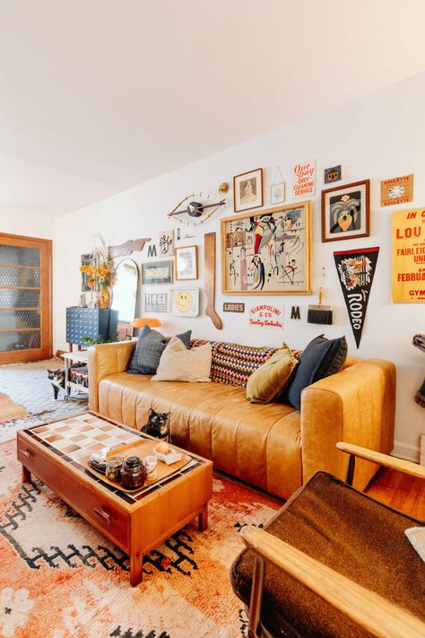 Vintage Music Living Room, Vintage Gallery Wall Around Tv, Gallery Wall With Records, Vintage Ads Art Living Room, Musicians Apartment, Philly Rowhome, Creative Accent Wall Ideas, Solo Living, Ladies Restroom