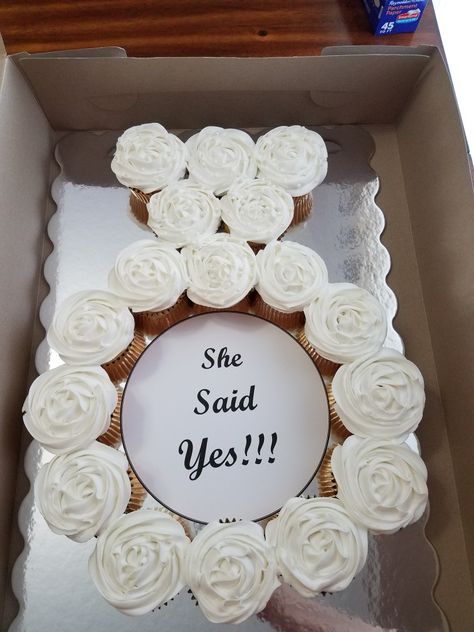 Mini engagement ring cupcake cake  "She said yes " Birthday And Engagement Party, Ring Cupcakes Engagement, She Said Yes Bridal Shower Invitations, Cupcake Engagement Ring, Bridal Brunch Cupcakes, Engagement Ring Cupcake Arrangement, Engagement Ring Cupcake Cake, She Said Yes Cupcakes, She Said Yes Decor