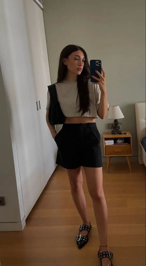 a minimal summer look with a crop tee, black cropped shorts, black studded flats and a black bag Black Sling Back Flats Outfit, Black Buckle Flats Outfit, Ganni Sandals Outfit, Ganni Buckle Ballerina, Buckle Ballet Flats Outfit, Ganni Ballerinas Outfit, Ganni Ballet Flats Outfit, Ganni Ballet Flats, Ganni Buckle Flats Outfit