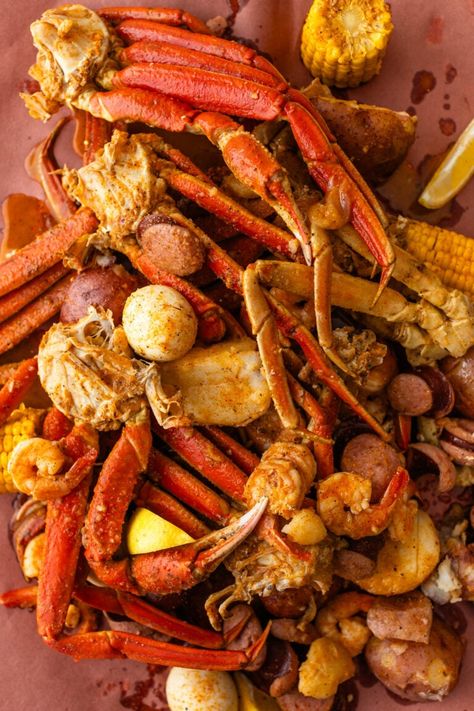 Louisiana Seafood Boil Recipe with Cajun Butter Sauce Cajun Crab Recipes, Louisiana Boil Recipe, Snow Crab Legs Recipe Boiled, Crab Leg Recipes Boiled, Cajun Seafood Boil Recipe, Cajun Shrimp Boil Recipe, Cajun Butter Sauce, Crab Boil Recipe, Seafood Boil Recipe