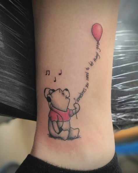 101 Amazing Winnie The Pooh Tattoo Designs You Need To See! 51 Outsons Winnie The Pooh Tattoos Small, Winnie The Pooh Memorial Tattoo, Winnie The Pooh Inspired Tattoos, Winnie The Pooh With Balloon Tattoo, Winny The Pooh Tattoos, Cute Winnie The Pooh Tattoos, Winnie The Pooh Balloon Tattoo, Pooh Bear Tattoo Ideas, Whinney Pooh Tattoo