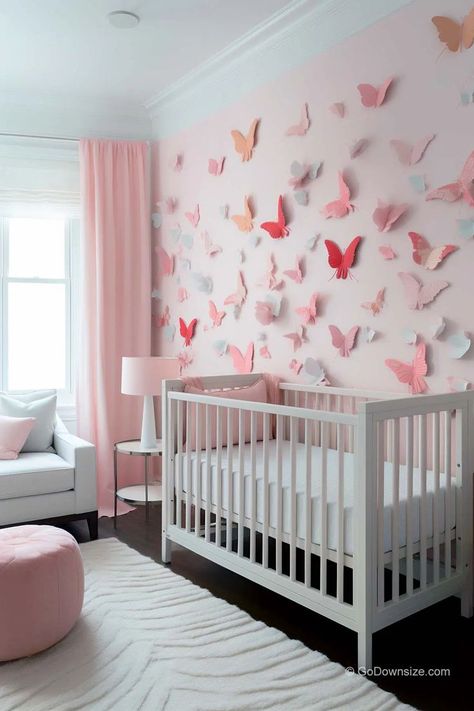 Go the extra mile and use a 3D design like this nursery with a pastel pink wall with fluttering butterflies distributed around the space. Butterfly Nursery Themes, Butterfly Baby Room, Twin Nursery Room, Organization Nursery, Pink Baby Nursery, Furniture Nursery, Closet Nursery, Pink Baby Room