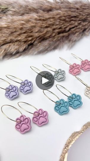 4.2K views · 174 reactions | Here are the most adorable paw print earrings I’ve ever seen 🥹 made out of polymer clay and SUPER lightweight. Here I’m showing you, because of all the detail in the cutter, I’m pressing into the clay twice. Once to get the cutter half way through the thickness of the clay and then lifting it, so the clay doesn’t stick inside the cutter (then it’s completely ruined because there’s no way to get it to release from the cutter without damaging/distorting the clay). And then a second time to completely cut it away from the clay slab and to make the piece that will turn into an earring. 

#clayearrings #dogearrings #lightweightearrings | @doxievibe | Handmade Clay Earrings… with my dog nearby | Taylor Swift · Fortnight (Acoustic Version) Paw Print Earrings, Handmade Clay Earrings, Dog Earrings, Twice Once, Handmade Clay, Clay Ideas, Ceramic Clay, Light Weight Earrings, My Dog