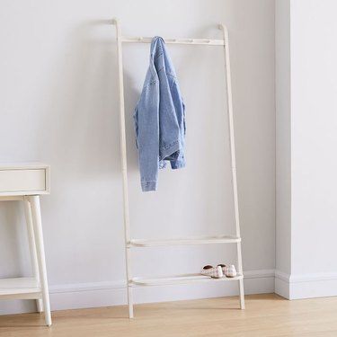 The Best Clothing Racks for Extra Bedroom Storage | Hunker Hanging Closet Organizer, Garment Rack, Clothes Stand, Organization Essentials, Storage Closet Organization, Hanging Clothes, Rack Design, Garment Racks, Closet Organizers