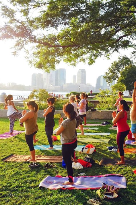 Namaste Wednesdays- New Yorkers no longer need to squeeze into scorching studios to practice hot yoga. Teacher Tejal Patel offers with her weekly classes in the wide-open spaces at Battery Park. The class takes place on a 25-acre green field, giving you space to stretch out on the cool grass after long days in the concrete jungle. Not only will Patel show you how to perfect your poses, but she's also full of wise words and motivational quips to energize you. The suggested donation is just $5, Yoga In The Park, Event Activations, Battery Park, Nyc Park, Full Time Travel, Green Field, Outdoor Yoga, Event Activities, Yoga Photography