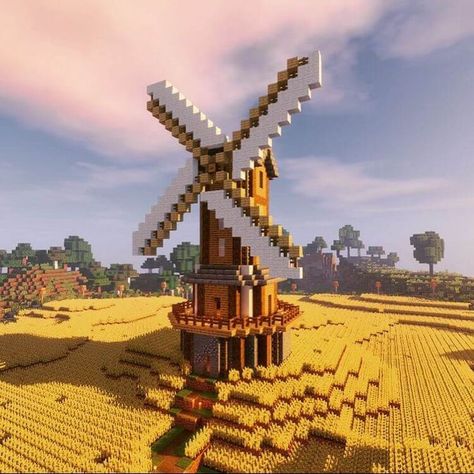 This Minecraft windmill is from an old singleplayer world known as Survival Experience. These pictures show the windmill and farm area in the world. Minecraft Windmill Design, Chalet Minecraft, Château Minecraft, Villa Minecraft, Construction Minecraft, Case Minecraft, Minecraft Statues, Rumah Minecraft Sederhana, Minecraft Structures