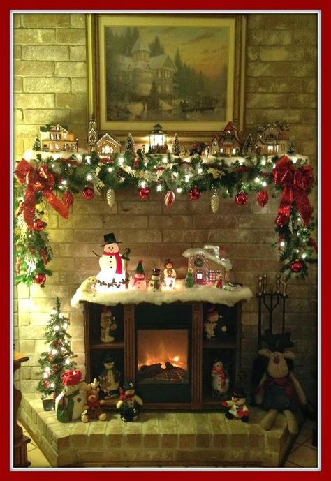 Christmas mantel, snow village, Christmas Village, garland: Holiday Mantel, Christmas Mantle Decor, Christmas Decorations For Kids, Christmas Village Display, Christmas Mantel, Village Display, Christmas Mantel Decorations, Christmas Mantle, Christmas Fireplace