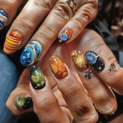 A display of striking cosmic-inspired nail art, featuring vibrant colors and intricate planet and star designs. Cosmic Nail Art, Bumble Bee Nails, Cosmic Nails, Autumn Manicure, Planet Nails, Bee Nails, Summer Nail Ideas, Prom Inspiration, Space Nails