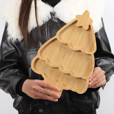 PRICES MAY VARY. CHRISTMAS TREE SHAPED: what you will receive are 1 pieces of christmas tree shaped bamboo serving platter, funny and cute,and it can meet your home and party decorating needs. HIGH QUALITY MATERIAL: Made of 100% Bamboo, elegant and durable. Well-sanded smooth surface, no splinters, burr and sharp corners. MULTI SCENARIO USAGE: It can be used as a children's plate in daily life, or as a snack tray during holidays, which is so exquisite and beautiful. SAFE AND NON-TOXIC: As a food Charcuterie Board Board, Christmas Cheese And Cracker Tray, Travel Charcuterie Board, Christmas Platters, Food Display Table, Cheese Charcuterie Board, Dining Plate, Cartoon Christmas Tree, Dining Plates