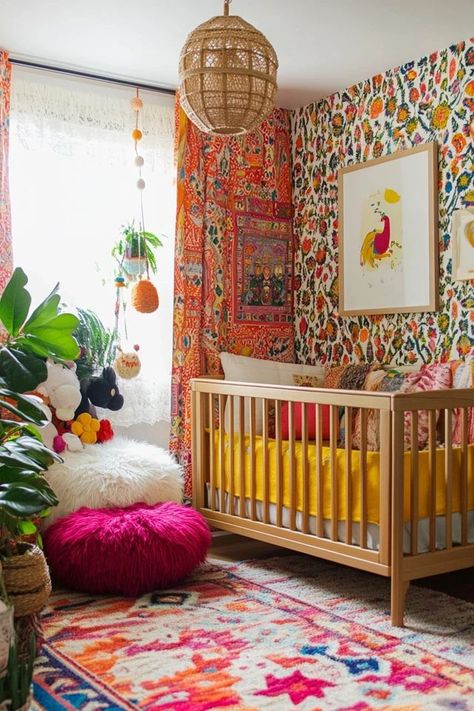 "Elevate your baby’s room with the charm of Bohemian Nursery Design! 🌿🍼 Perfect for creating a unique and comforting environment for your little one. 🌟✨ #BohoDecor #NurseryDesign #BohoChic" Boho Tropical Nursery, Girl Nursery Ideas Colorful, Maximalist Baby Nursery, Nursery Ideas Colourful, Red Nursery Ideas, Funky Nursery Ideas, Nursery Ideas Orange, Disco Nursery, Artsy Nursery