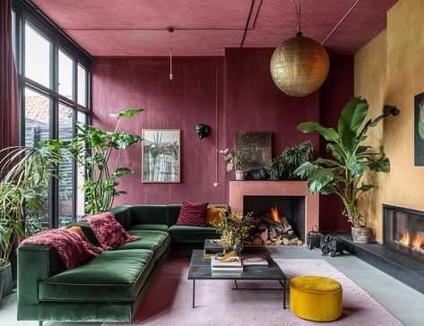 Accent Wall For Dark Room, Dark Green Velvet Sofa Living Room Ideas, Bright Bold Living Room, Green Sofa Pink Walls, Green Burgundy Living Room, Burgundy And Gold Living Room Ideas, Burgundy And Blush Living Room, Contrast Fireplace, Green And Maroon Living Room