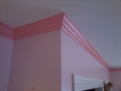 Crown Molding painted dark pink as an accent and complement to the lighter pink walls. Pink Baseboards And Trim, Pink Crown Molding Wall, Pink Walls With Pink Trim, Pink Wall Trim, Pink Wall Molding, Pink Walls Dark Floor, Pink Baseboards, Pink Walls Wood Trim, Pink Crown Molding