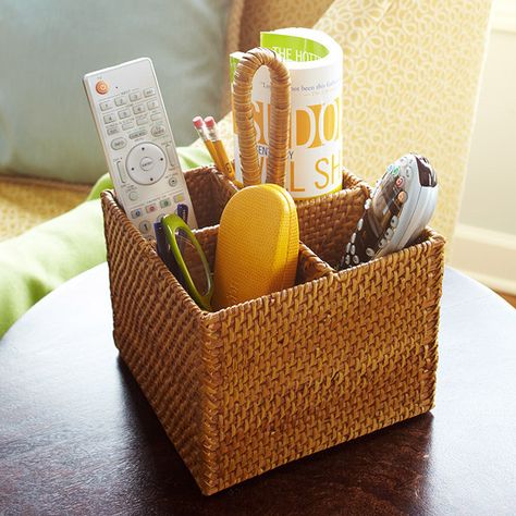 Contain clutter with these easy, DIY organization and storage solutions. We'll help you bring order to your living room, mudroom, kitchen, office, garage, closet, and more while keeping your home stylish and personalized. Family Room Organization, Organizing With Baskets, Silverware Caddy, Remote Control Organizer, Flatware Caddy, Utensil Organization, Basket Organization, Life Organization, Cleaning Organizing