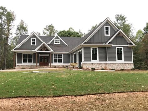 Sw 7019 Exterior Gray Brown House Exterior, Gray And Brick House Exterior, Dark Gray Ranch House, Sw Storm Warning Exterior, Dark Gray Vinyl Siding Exterior, Dark Grey Exterior House Colors Modern, Gauntlet Grey Exterior House, Night Gray House Exterior, Sw Westchester Gray Exterior