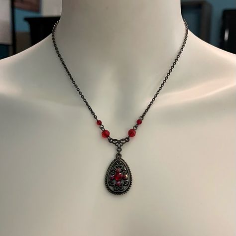 Brand New Without Tags And Absolutely Gorgeous Describes This 2028 Red Beaded Black-Tone Teardrop Necklace. This Necklace Has Black Tone Chain With Filigree Details And Red Luscious Beads On The Chain And Pendant. Set In Black-Tone Mixed Metal. Approx. Length - 16" + 3" Extender, Approx. Drop - 1" Lobster Clasp Closure