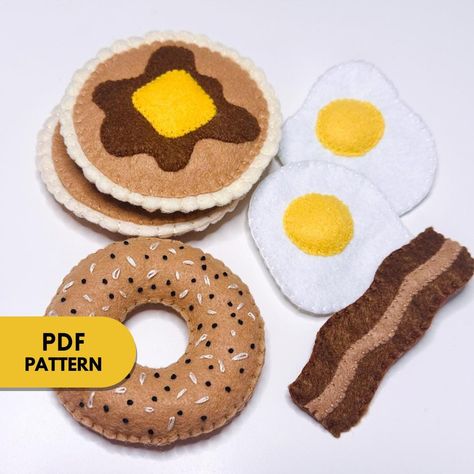 This is a PDF document that includes: A List of Materials Written Step by Step instructions Shape Templates You will learn to create Felt Breakfast Foods. Upon purchase, you will receive an instant download that can be accessed on your Desktop Computer under Purchases on the Etsy Website. Whether you are just learning or an avid sewer, this is a fun project to do year-round! Visit my TikTok page for Video Tutorial Examples https://www.tiktok.com/@annelourayne?is_from_webapp=1&sender_device=pc This tutorial is for personal use only. You may not sell products made from this pattern. Re-sale or distribution of patterns and tutorial , in any form, is strictly prohibited. Fabric Food Patterns, Felt Egg Pattern, Felt Breakfast Food, Felt Bagel, Felt Food Patterns Free Templates, Free Felt Patterns, Felt Food Templates, Felt Bread, Felt Pie