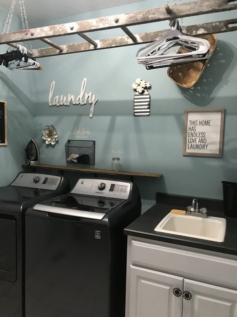 Ladder In Laundry Room Hanging, Laundry Room Ladder Drying Rack, Laundry Ladder Drying Rack, Ladder Clothes Hanger, Ladder Laundry Room, Country Laundry Room Ideas, Old Wooden Ladder Ideas, Laundry Room Wall Ideas, Western Laundry Room