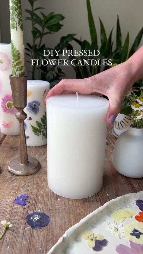 DIY Pressed Flower Candles are the perfect #mothersday gift! Here's how to make them: ✍️ You’ll need: 🕯A plain pillar candle (taper candles work, too) 🌼 Pressed flowers (you can #DIY this - details below - or purchase beautiful pre-pressed ones online for ~$10) 🔪 A small palette or butter knife for pressing + a small votive candle with the same color wax as your main candle 1️⃣ Heat the palette knife over the flame of the votive candle for at least 10 seconds. 2️⃣ Arrange a pressed flow Pressed Flower Taper Candle, Diy Unique Gifts, Mothersday Diy, Pressed Flower Candles, Diy Candles With Flowers, Mothersday Gifts Diy, Dried Flower Candles, Pressed Flowers Diy, Flower Candles