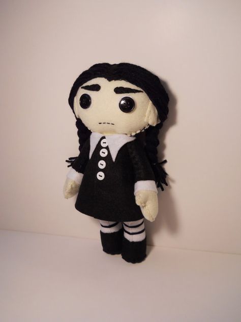 Hey, I found this really awesome Etsy listing at https://www.etsy.com/listing/109878948/felt-wednesday-addams-inspired-custom Felt Wednesday, Wednesday Addams Doll, Wednesday Addams Inspired, Creepy Toys, Custom Plush, Goth Decor, Valley Of The Dolls, Fall Halloween Crafts, Living Dolls