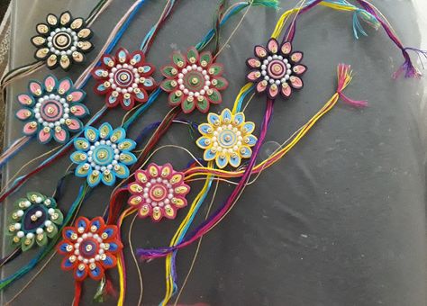 Quilling Rakhi Ideas, Paper Quilling Rakhi Design, Quilling Rakhi, Handmade Rakhi Designs, Princess Closet, Rakhi Making, Paper Quilling Jewelry, Handmade Rakhi, Rakhi Design