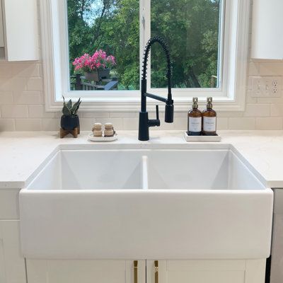 Sometimes a little order can bring things back into balance. The Austen double bowl farmhouse fireclay kitchen sink helps you organize the clean from the dirty by making space for washing and drying dishes at the same time. Our ultra-durable and dense fireclay is fired up to 2100° F and protected with our proprietary finish that safeguards and adds strength. Sinkology Size: 10" H x 36" L x 18" W | Sinkology Austen Fireclay Double Bowl Farmhouse Apron Front Undermount Kitchen Sink & Drain 10.0 H White Farmhouse Sink With White Cabinets, Farmhouse Sink Black Faucet, White Sink Black Faucet, White Farm Sink, Double Farmhouse Sink, Farm Style Sink, Kitchen Sink White, Farmers Sink, White Farmhouse Sink