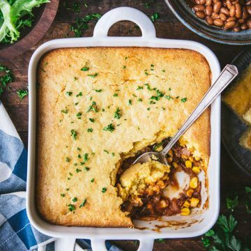 A zesty filling made with bbq pulled pork, peppers, onions, and corn is topped with a cheesy cornbread crust in this easy and delicious pulled pork casserole. Pair it with a crisp green salad, Southern-style green beans, a creamy cucumber dill salad, or crunchy, refreshing coleslaw. It's a great way to take advantage of leftover pulled pork or a container of store-bought shredded meat. Casserole With Cornbread Topping, Recipes Using Pulled Pork, Leftover Pulled Pork Casserole, Casserole With Cornbread, Pulled Pork Casserole, Cornbread Topping, Jiffy Mix Recipes, Cornbread Crust, Pulled Pork Leftover Recipes