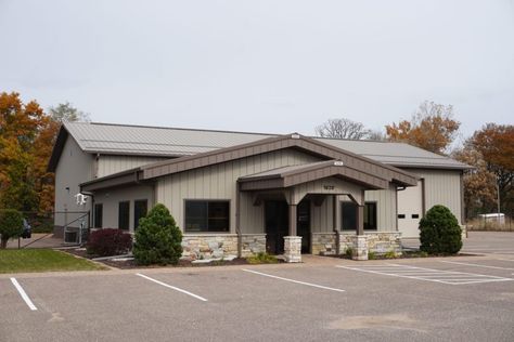 Built in 2017, this metal machine shed with an attached office would be perfect for any small business. The shop in the back can be steel-lined and insulated to keep your employees warm in the winter. The attached office with a deep fascia overhang and porch makes for great curb appeal. If this building does not fit your business, perhaps it would serve as a personal office with an attached storage building for your RV, boat or luxury car. Metal Buildings For Business, Metal Building With Office Space, Metal Building For Business, Metal Building Business Exterior, Shop With Office, Boutique Warehouse, Ranch Entrance, Office Building Plans, Garden Boutique