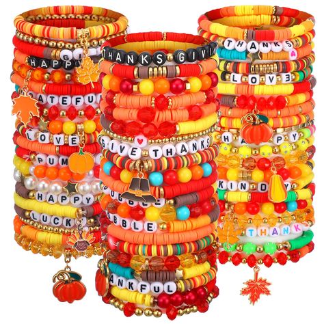 PRICES MAY VARY. Variety: you will receive 62 pieces of colorful stretch beaded bracelets in different styles, including maple leaves, pumpkins, 'thanksgiving' and other Thanksgiving elements; With classic colors, they are a delicate accessory for your wrist, and you can share them with your friends and family Comfortable Material: our stackable stretch bracelets are made from polymer clay and elasticated bands that are not only stylish but also easy to wear, with elasticity to fit wrists of dif Thanksgiving Bracelet Ideas, Fall Clay Bead Bracelet Ideas, Thanksgiving Bead Bracelet, Fall Bracelets, Stretch Beaded Bracelets, Candy Bracelets, Rainbow Vinyl, Arm Candy Bracelets, Heishi Bracelets