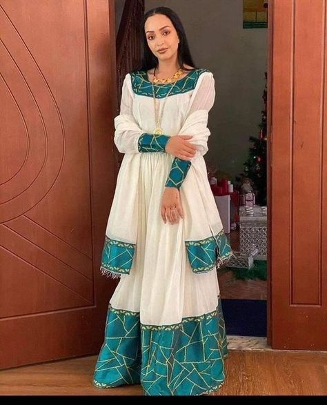 Ethiopian traditional dress Habesha Kemis Ethiopian Dress, Habesha Culture, Ethiopian Hair, Ethiopian Dresses, Eritrean Clothing, Ethiopian Wedding Dress, Eritrean Dress, Beautiful Ethiopian, Ethiopian Wedding