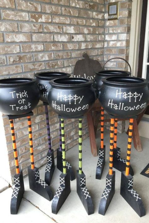 If you're looking for an awesome candy bowl, how about one of these cool cauldrons with witches' legs? They look fabulous either in the house or outdoors and are a sure hit this Halloween. If you're doing a socially distanced Halloween, just put one of these out on your yard, and let your trick-or-treaters help themselves. See more party ideas and share yours at CatchMyparty.com #catchmyparty #partyideas #halloween #halloweenpartydecorations #outdoorhalloweenpartydecorations #partysupplies Halloween Outdoor Decoration, Halloween Candy Bowl, Cute Halloween Decorations, Halloween Wood Crafts, Witch Legs, Harry Potter Halloween, Adornos Halloween, Halloween Tattoo, Decor Shabby Chic