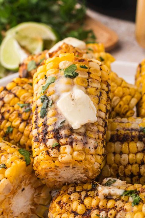 Air Fryer Corn on the Cob Air Fryer Corn on the Cob is the perfect easy side dish for summer, turning fresh corn into tender, plump perfection with a blend of spices, fast and ready in just minutes. This delicious method ensures each cob is cooked to deliciousness, making it a go-to for quick and tasty meals. Corn On The Cobb On Stove, Air Fry Corn On The Cob, Corn On The Cob Air Fryer Recipes, Fresh Corn On The Cob Recipes, Air Fryer Corn On The Cob, Meal Ideas With Corn On The Cob, Ninja Foodi Corn On The Cob, Corn In Air Fryer, Air Fryer Roasted Corn On The Cob