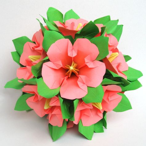 Flowers from pentagon for this tutorial http://stranamasterov.ru/node/47890  Leaves from the book "Hana no kusudama" by Mariko Kubo Hibiscus Origami, Valentines Origami, Paper Origami Flowers, 4h Ideas, Craft Origami, Paper Flower Patterns, Origami And Quilling, Origami And Kirigami, Origami Ideas