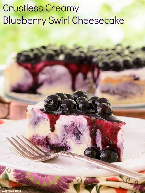 Crustless Creamy Blueberry Swirl Cheesecake has a fresh blueberry sauce swirled throughout and is topped with a creamy layer, fresh blueberries, and homemade sauce. Crust isn't needed for this incredible cheesecake. Blueberry Swirl Cheesecake, Cheesecakes Recipes, Blueberry Bites, Blueberry Cheesecake Recipe, Swirl Cheesecake, Blueberry Sauce, Low Carb Cheesecake, Blueberry Desserts, Best Cheesecake