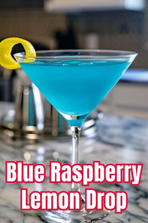 Delight in the sweet and tangy Blue Raspberry Lemon Drop, a vibrant and fun cocktail. Click to find out how to make this delicious drink! Raspberry Vodka Drinks, Winter Vodka Cocktails, Raspberry Lemon Drop, Lemon Drop Recipe, Lemon Drop Cocktail, Vodka Blue, Vodka Cocktails Easy, Summer Vodka Cocktails, Raspberry Vodka