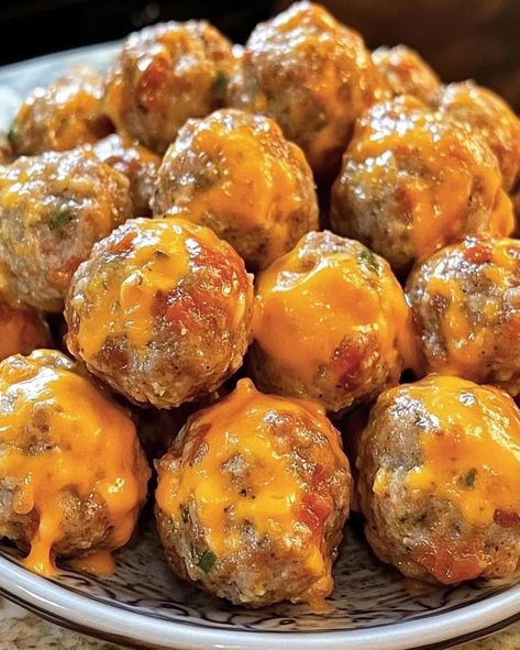 Make delicious Rotel Cream Cheese Sausage Balls with sausage, cheese, and Rotel. A perfect quick appetizer for any gathering or snack time! Ro Tel Cream Cheese Sausage Balls, Rotel Cheese Sausage Balls, Sausage Crescent Cheese Balls, Rites Cream Cheese Sausage Balls, Totem Cream Cheese Sausage Balls, Royal Cream Cheese Sausage Balls, Cheese Balls For Halloween, Cream Cheese Rotelle Sausage Balls, Rotes Cream Cheese Sausage Balls