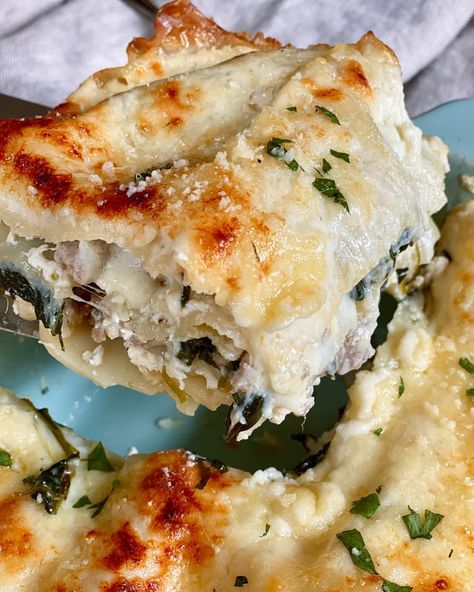 White Lasagna Recipe (with Béchamel, Italian Sausage, and Spinach) | Kitchn White Lasagna Recipe, Casserole Lasagna, White Sauce Lasagna, Sausage Ricotta, Recipe With Ricotta, Italian Sausage Lasagna, Lasagna Recipe With Ricotta, Sausage And Spinach, White Lasagna