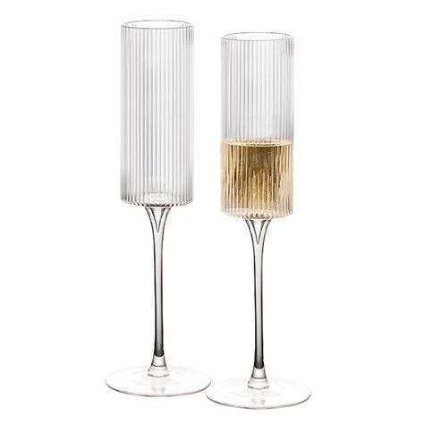 PRICES MAY VARY. VINTAGE FLUTED DESIGN: Elevate your table and show it off in any occasion with this unique fluted design. The ribbed body of these glasses add a modern twist to a classic piece. SET OF 2: Enjoy a glass of your favorite champagne with these attractive ribbed glasses. With 2 glasses in each set, you'll have enough for everyone at your next gathering or dinner party. UNPARALLELED QUALITY: Indulge in the timeless elegance of our vintage wine glasses, meticulously crafted with precis Tall Champagne Glasses, Ribbed Glasses, Amazing Kitchens, Vintage Champagne Glasses, Glasses Unique, Vintage Wine Glasses, Vintage Champagne, Vintage Wine, Modern Trend