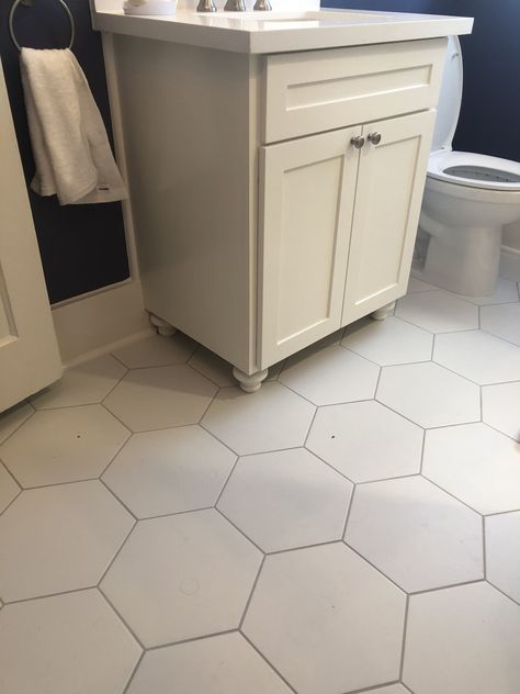 Octagon white tile bath floor with light gray grout to highlight the pattern. Accent with your favorite color. Hexagon Tile Mudroom Floor, Octagonal Tile Floor, Hexagon Tile With Dark Grout, White Hexagon Kitchen Floor, White Octogon Tiles Bathroom, Octogon Tiles Bathroom, Small White Hexagon Tile Bathroom, White Octagon Tile Bathroom, Octagon Tile Bathroom Floor