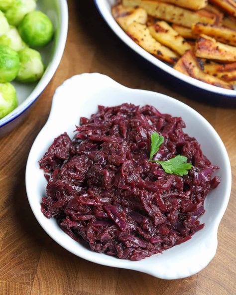 This deeply spiced braised red cabbage with apple and balsamic vinegar is an easy vegan and gluten-free side dish that pairs perfectly with winter comfort food and is a must for Christmas dinner! It can also be made ahead and stored in the fridge or freezer and re-heated on the day for ultimate convenience. #braisedredcabbage #christmasredcabbage #vegansides #veganchristmas #veganredcabbage #glutenfreesides #glutenfreechristmas Braised Red Cabbage And Apples, Cabbage With Balsamic Vinegar, Layered Potato Bake, Red Cabbage With Apples, Vegetable Pot Pies, Braised Red Cabbage, Layered Potato, Winter Meals, Gluten Free Sides