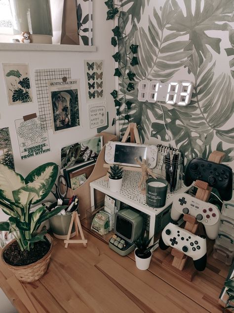 #green #aesthetic #nintendoswitch #nintendo #nintendoswitchlite #controllers #plants #plant #desk #desktour #desksetup #homedecor #decor #gamingroom #wallart Cute Desk Setup, Plant Desk, Cozy Desk, Gamer Room Decor, Desk Inspiration, Office Room Decor, Cute Desk, Gaming Room Setup, Cute Room Ideas