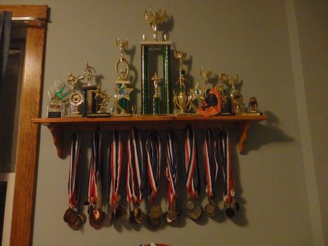 One way to display lots of medals and trophies Trophies And Medals Aesthetic, School Medals Aesthetic, Medals Aesthetic, Medals And Trophies, 1000 Peso Bill Philippines, Football Medals, Martial Arts Gym, Boxer Aesthetic, High School Story