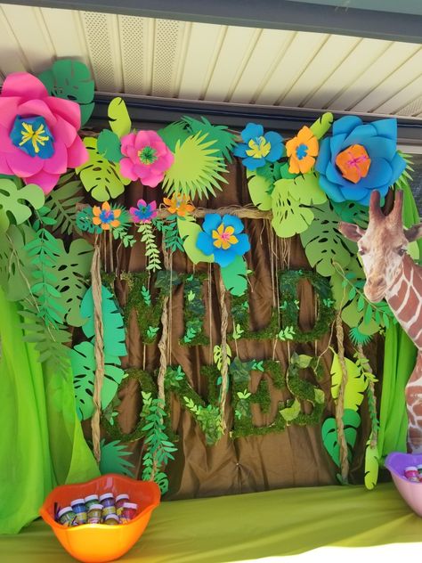 #wildone #partyideas #backdrop #partyideas #backdropideas #wildoneparty #ideasparafiestas #partydecorations #decorideas #backdrop  More items on FB and IG @creationswithgrace Jungle Theme Classroom Decorations, Jungle Crafts, Decoration Creche, Jungle Theme Classroom, Rainforest Theme, Jungle Decorations, Potpourri Christmas, Jungle Flowers, Deco Jungle