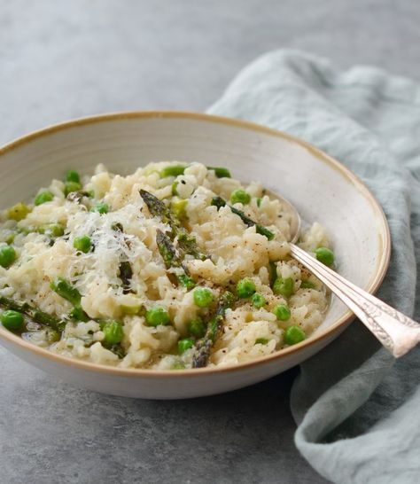 Spring Risotto with Asparagus & Peas - This spring risotto calls for seasonal vegetables but there’s lots of room for creativity and improvisation. Don’t feel like asparagus? Substitute zucchini or mushrooms. Going vegetarian? Replace the chicken broth with vegetable broth. Want to fancy it up? Stir in some fresh herbs at the end. You really can’t go wrong as long as you stick to the basic formula. Serve this spring risotto as a meatless main course or as a side to a simply cooked main dish. Spring Risotto, Risotto With Asparagus, Italian Rice Dishes, Asparagus And Peas, Cooking Risotto, Vegetarian Main Course, Going Vegetarian, Pan Seared Salmon, Risotto Recipes