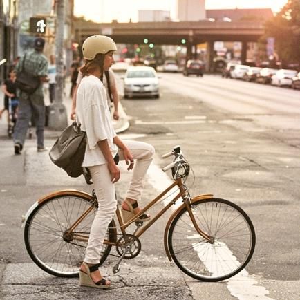 UPDATE - Check out our Runway-inspired list! The search for a cool bike helmet is never-ending. A stylish head-protector can enhance your outfit. And help you f Women Biking Outfit, Cute Helmets For Women, Cute Bike Outfit, Cute Bike Riding Outfits, Biking Outfit Women, Bike Style Women, Cute Bike Helmet, Commuter Bike Style, Bicycle Helmets For Women